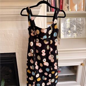Maeve Danielle Kroll makeup vanity mirror pattern dress